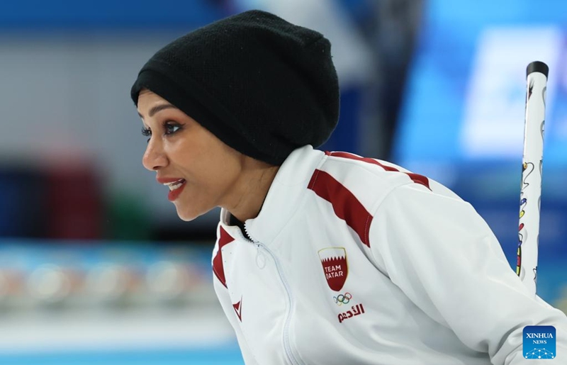 Mabarka Salem Al-Abdulla competes during the mixed doubles Round Robin Group B Session 5 match between Mabarka Salem Al-Abdulla/Nasser Abdulrahman Alyafei of Qatar and Amina Seitzhanova/Azizbek Nadirbayev of Kazakhstan in the curling event at 2025 Asian Winter Games in Harbin, northeast China's Heilongjiang Province, Feb. 5, 2025. Photo: Xinhua