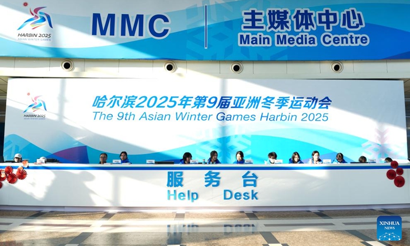 Volunteers work at a help desk in the main press center in the Main Media Center (MMC) of the 2025 Asian Winter Games in Harbin, northeast China's Heilongjiang Province, Feb. 5, 2025. Photo: Xinhua