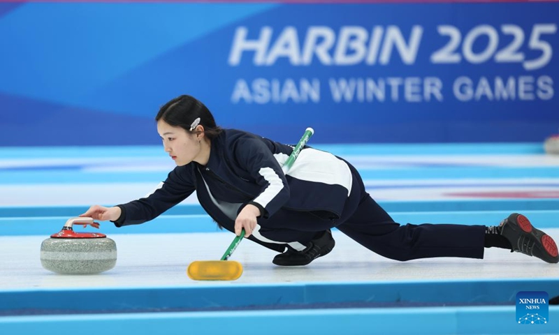 Enkhzaya Ganbat competes during the mixed doubles Round Robin Group A Session 5 match between Enkhzaya Ganbat/Bayar Bulgankhuu of Mongolia and Chanatip Sonkham/Teekawin Jearateerawit of Thailand in the curling event at 2025 Asian Winter Games in Harbin, northeast China's Heilongjiang Province, Feb. 5, 2025. Photo: Xinhua