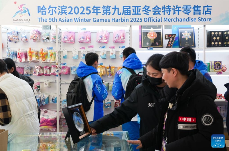 Customers select souvenirs at an official merchandise store in the main press center in the Main Media Center (MMC) of the 2025 Asian Winter Games in Harbin, northeast China's Heilongjiang Province, Feb. 5, 2025. Photo: Xinhua