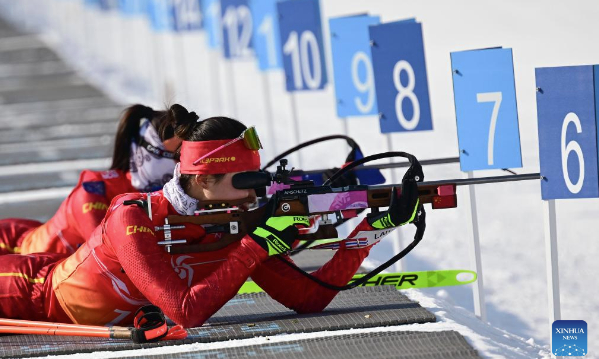 Chu Yuanmeng (front) and Meng Fanqi of China compete during the Biathlon women's 7.5km sprint match at the 9th Asian Winter Games in Yabuli, northeast China's Heilongjiang Province, Feb. 11, 2025 (Xinhua/Zhang Long)