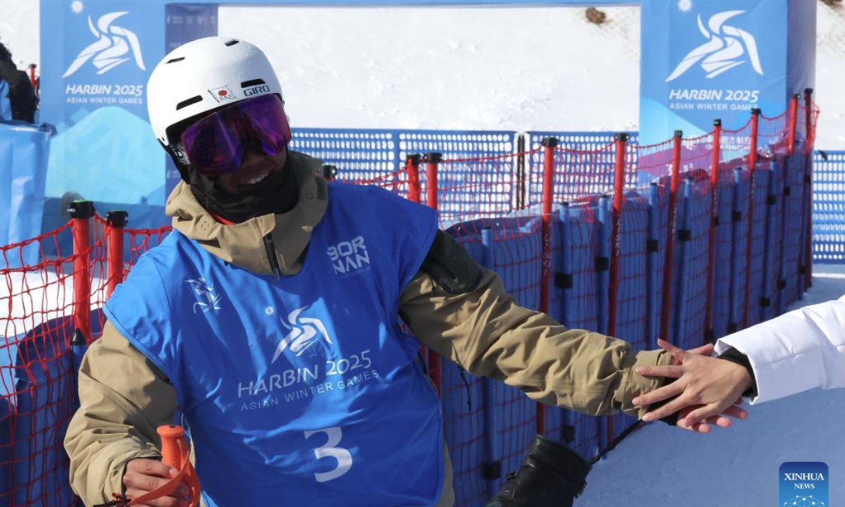 Kasamura Rai of Japan celebrates during the Freestyle Skiing men's freeski slopestyle final at the 9th Asian Winter Games in Yabuli, northeast China's Heilongjiang Province, Feb. 11, 2025. (Xinhua/Yang Qing)