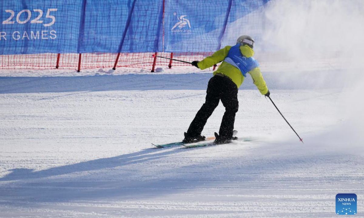 Lin Hao of China competes during the Freestyle Skiing men's freeski slopestyle final at the 9th Asian Winter Games in Yabuli, northeast China's Heilongjiang Province, Feb. 11, 2025. (Xinhua/Mu Yu)