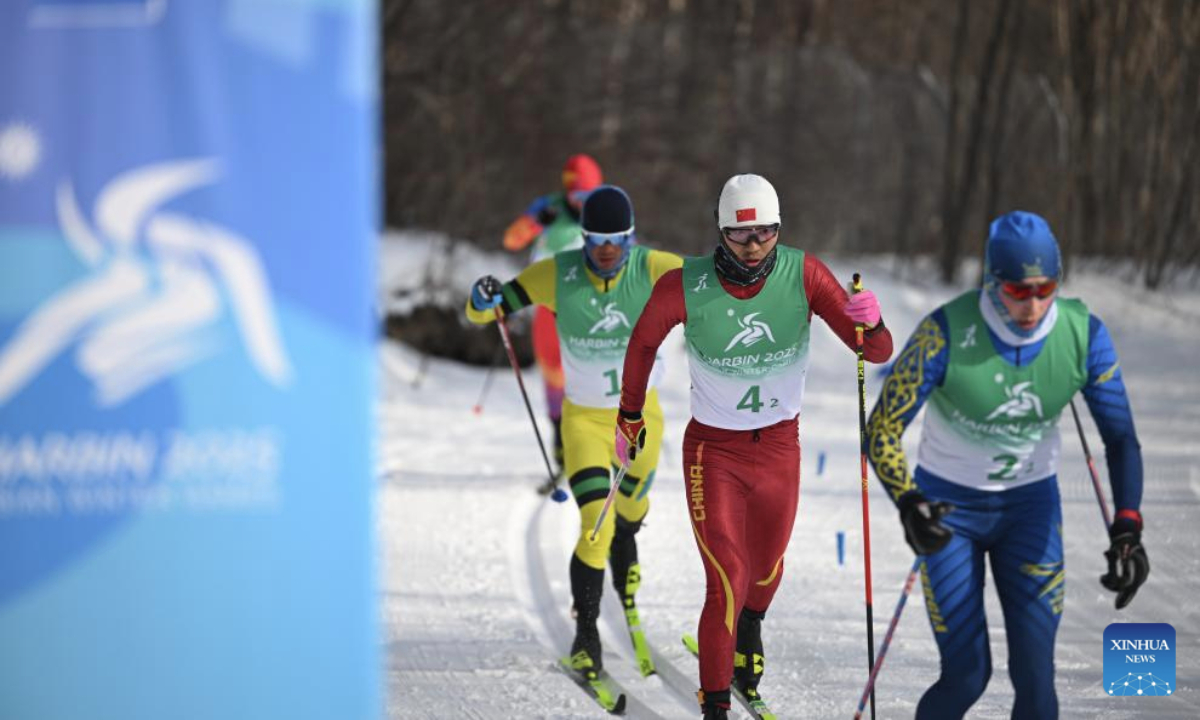 Cirenzhandui (2nd R) of China competes during the Cross-Country Skiing men's 4x7.5km relay match at the 9th Asian Winter Games in Yabuli, northeast China's Heilongjiang Province, Feb. 12, 2025. (Xinhua/Wu Zhizun)