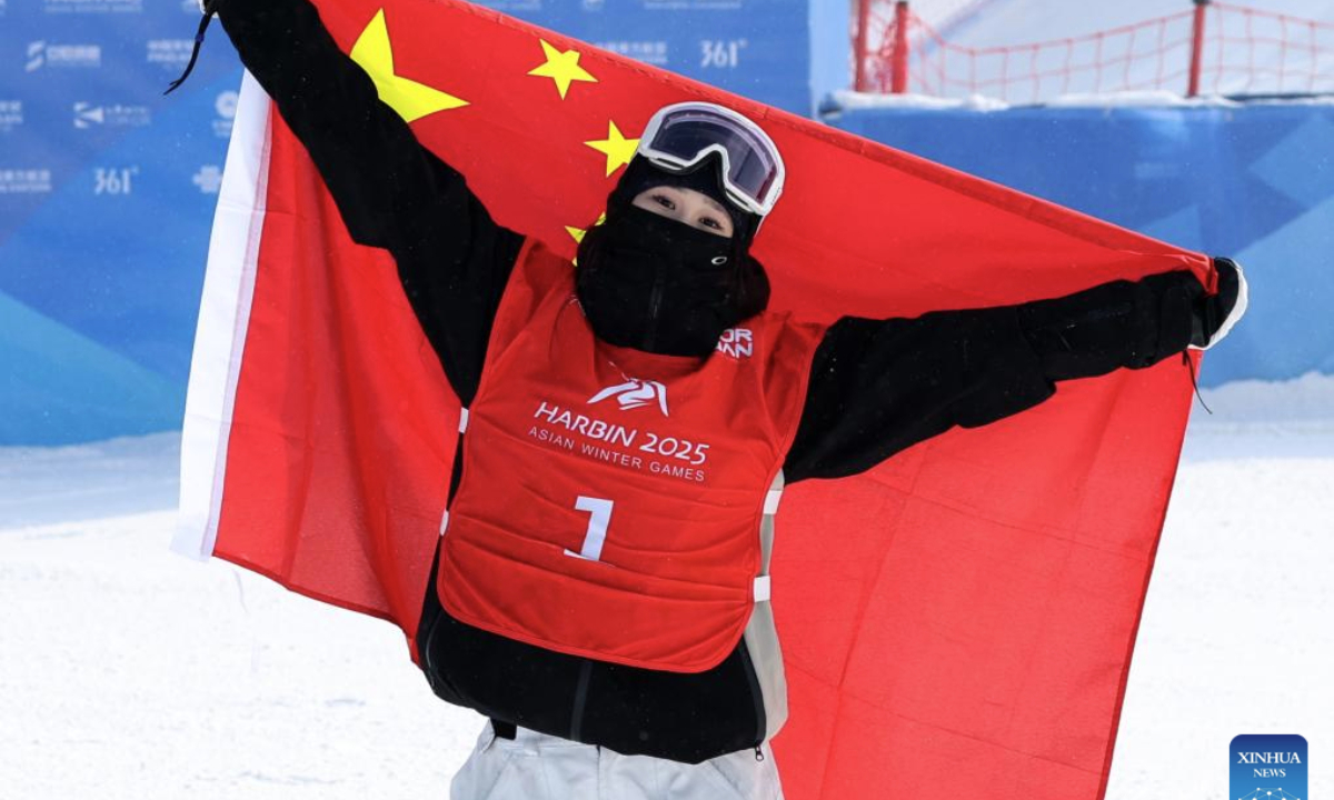 Liu Mengting of China celebrates after the Freestyle Skiing women's freeski big air final match at the 9th Asian Winter Games in Yabuli, northeast China's Heilongjiang Province, Feb. 12, 2025. (Xinhua/Zhang Chenlin)