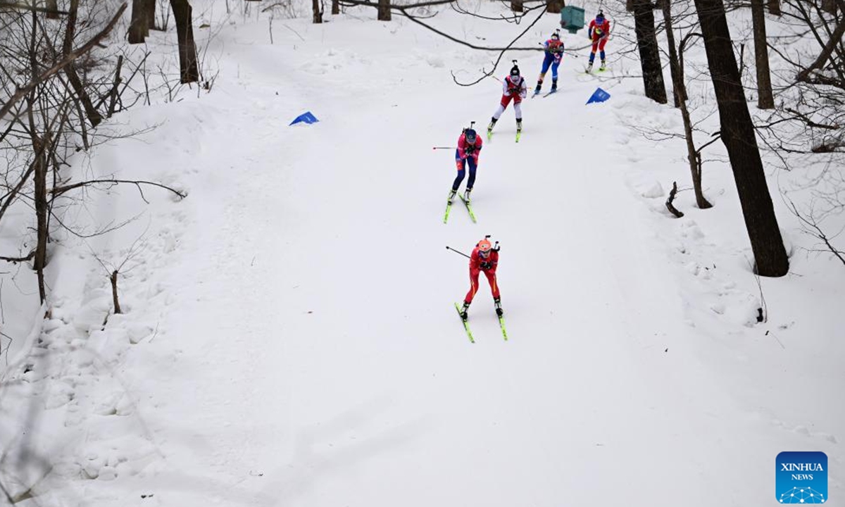 Tang Jialin (front) of China competes during the Biathlon women's 4x6km relay match at the 9th Asian Winter Games in Yabuli, northeast China's Heilongjiang Province, Feb. 13, 2025. (Xinhua/Zhang Long)