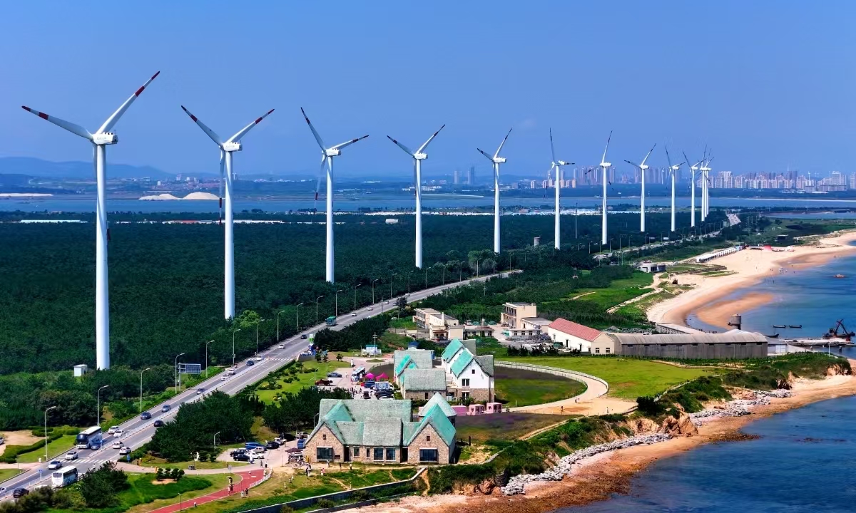 A line of wind turbines operated in Longchen, Shandong Province, eastern China on July 31, 2024. Photo: VCG