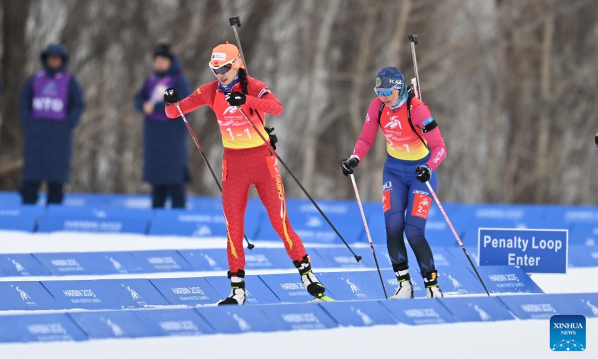 Tang Jialin (L) of China and Olga Poltoranina of Kazakhstan compete during the Biathlon women's 4x6km relay match at the 9th Asian Winter Games in Yabuli, northeast China's Heilongjiang Province, Feb. 13, 2025. (Xinhua/Wu Zhizun)