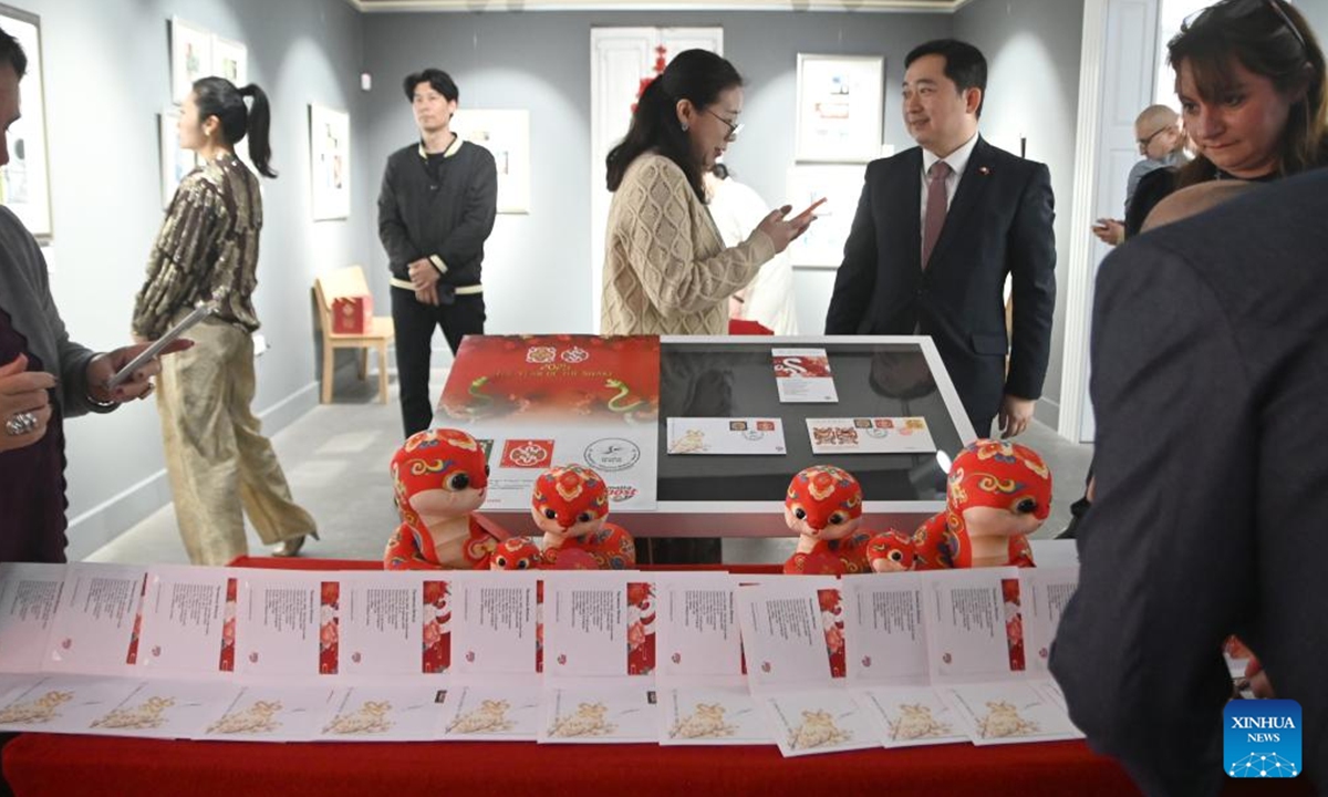 People attend a ceremony to release Year of the Snake zodiac postage stamps in Valletta, Malta, Feb. 12, 2025. MaltaPost unveiled these stamps here on Wednesday, marking the second consecutive year the country has issued stamps celebrating the Chinese Lunar New Year.

The newly released set of two stamps, designed by Maltese artist Fabio Agius and Chinese designer Fang Jun, showcases a unique blend of Maltese and Chinese cultural motifs. (Photo by Jonathan Borg/Xinhua)