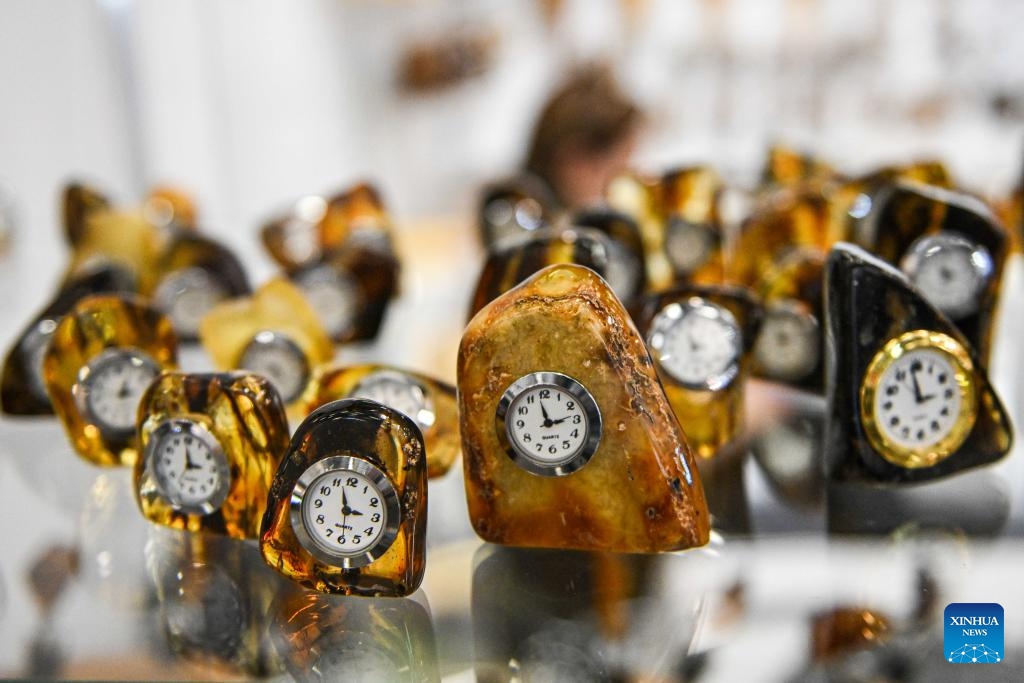 Photo taken on Feb. 13, 2025 shows amber products at the International Baltic Jewelry Show in Vilnius, Lithuania. The 21st International Baltic Jewelry Show titled Amber Trip kicked off here in Vilnius on Thursday. (Photo: Xinhua)