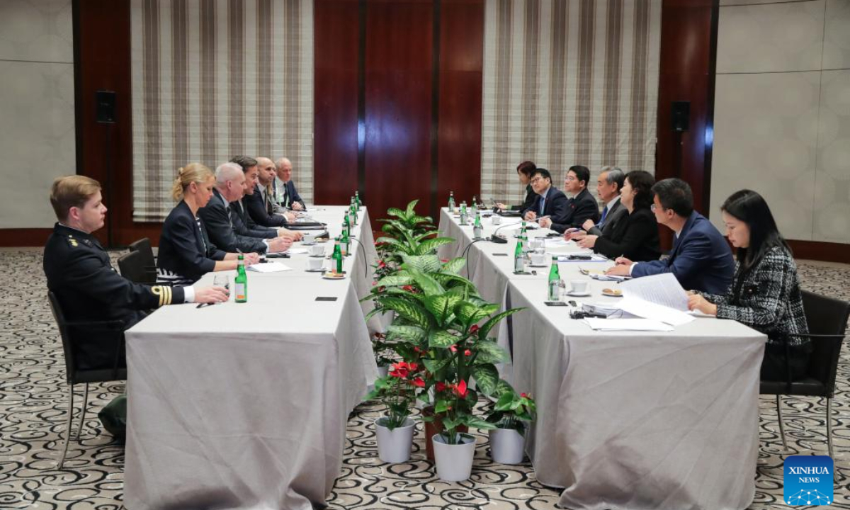 Chinese Foreign Minister Wang Yi, also a member of the Political Bureau of the Communist Party of China Central Committee, meets with Secretary General of the North Atlantic Treaty Organization (NATO) Mark Rutte on the sidelines of the Munich Security Conference, in Munich, Germany, Feb. 14, 2025. (Xinhua/Zhang Fan)