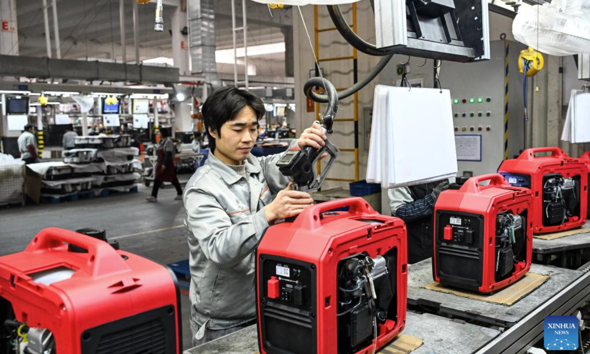 A worker operates at a production line of Chongqing Hwasdan Machinery Manufacturing Co., Ltd. in southwest China's Chongqing Municipality, Feb. 22, 2025. In recent years, the local government has launched a series of policies for the high-quality development of the city's private sector, covering areas such as technological innovation, market expansion and financial support. In 2024, the economic value added of Chongqing's private sector reached 1.98 trillion yuan (about 273 billion U.S. dollars). (Xinhua/Wang Quanchao)