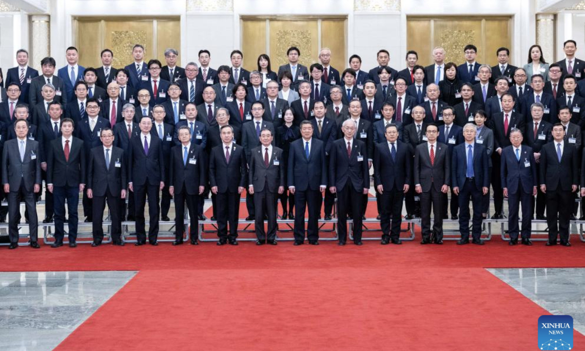 Chinese Vice Premier He Lifeng, also a member of the Political Bureau of the Communist Party of China Central Committee, meets with a Japanese business delegation visiting China at the Great Hall of the People in Beijing, capital of China, Feb. 17, 2025. (Xinhua/Zhai Jianlan)