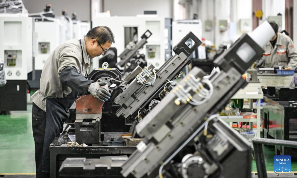 A worker operates at a workshop of Chongqing Honggang Numerical Control Machine Tool Co., Ltd. in southwest China's Chongqing Municipality, Feb. 22, 2025. In recent years, the local government has launched a series of policies for the high-quality development of the city's private sector, covering areas such as technological innovation, market expansion and financial support. In 2024, the economic value added of Chongqing's private sector reached 1.98 trillion yuan (about 273 billion U.S. dollars). (Xinhua/Wang Quanchao)