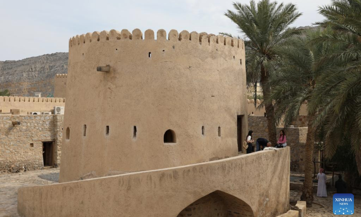 Tourists visit Khasab Fort in the Musandam Governorate of Oman, Feb. 17, 2025. Built in the 17th century, Khasab Fort once served as a military stronghold, a judicial center, and the residence of the governor. It has been restored as a regional exhibition center and a renowned tourist attraction. (Xinhua/Wang Qiang)