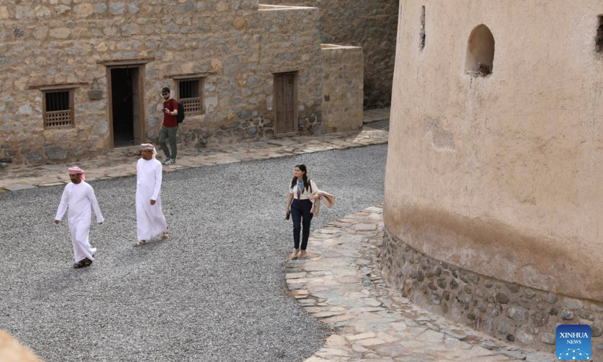 Tourists visit Khasab Fort in the Musandam Governorate of Oman, Feb. 17, 2025. Built in the 17th century, Khasab Fort once served as a military stronghold, a judicial center, and the residence of the governor. It has been restored as a regional exhibition center and a renowned tourist attraction. (Xinhua/Wang Qiang)