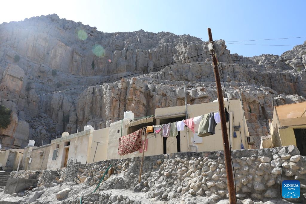 This photo taken on Feb. 19, 2025 shows a view of Kumzar Village in Oman. Kumzar, a remote fishing village in the Musandam Peninsula in northern Oman, located in a sheltered harbor near the strategic shipping lane of the Strait of Hormuz. Due to its unique geographical location, Kumzar can only be accessed by boat, making it relatively isolated from the rest of Oman. This isolation has helped preserve its distinct cultural and linguistic identity. The residents of Kumzar primarily rely on fishing for their livelihood, maintaining a traditional maritime way of life. (Photo: Xinhua)