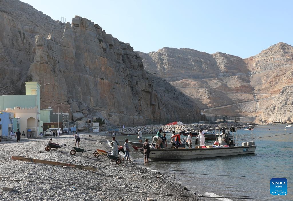 This photo taken on Feb. 19, 2025 shows the entrance to Kumzar Village in Oman. Kumzar, a remote fishing village in the Musandam Peninsula in northern Oman, located in a sheltered harbor near the strategic shipping lane of the Strait of Hormuz. Due to its unique geographical location, Kumzar can only be accessed by boat, making it relatively isolated from the rest of Oman. This isolation has helped preserve its distinct cultural and linguistic identity. The residents of Kumzar primarily rely on fishing for their livelihood, maintaining a traditional maritime way of life. (Photo: Xinhua)