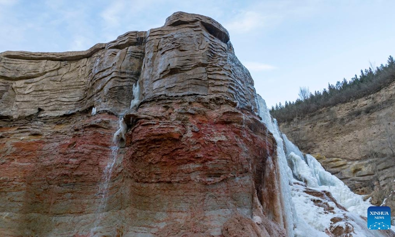 A drone photo taken on Feb. 18, 2025 shows the scenery of Ruhe waterfall in Pengyang County, Guyuan City of northwest China's Ningxia Hui Autonomous Region. (Photo: Xinhua)