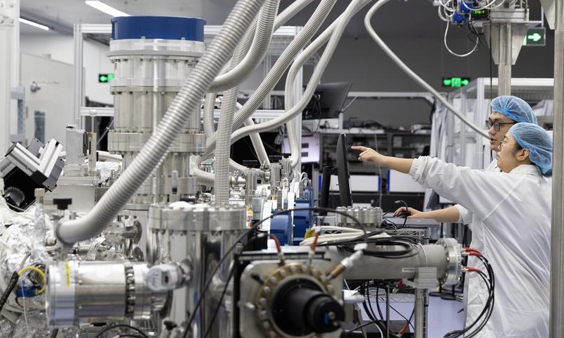 Researchers work at an experimental station of the Synergetic Extreme Condition User Facility (SECUF) in Beijing, capital of China, Oct. 16, 2024. (Xinhua/Jin Liwang)