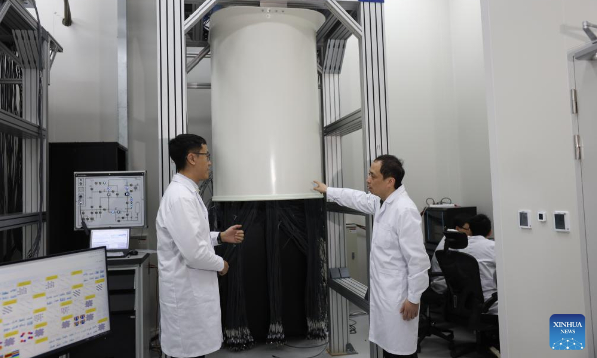 Chinese quantum physicist Zhu Xiaobo (R) has a discussion with a student at a laboratory in Hefei, east China's Anhui Province, on March 3, 2025. Chinese scientists unveiled a superconducting quantum computer prototype named Zuchongzhi 3.0 with 105 qubits on Monday (Beijing Time), marking a breakthrough in China's quantum computing advancements.

The achievement also sets a new record in quantum computational advantage within superconducting systems.(Photo by Dai Rui/Xinhua)