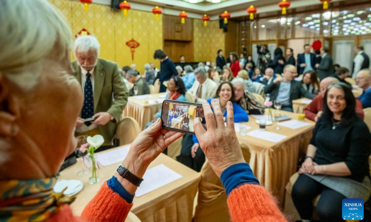 Guests take a photo at a reception for the families of the Lisbon Maru survivors in London, Britain, on Feb. 22, 2025.

The Chinese Embassy in the United Kingdom hosted a special reception in London on Saturday for the families of the Lisbon Maru survivors, commemorating the heroic rescue during World War II and celebrating the Spring Festival. (Photo by Stephen Chung/Xinhua)