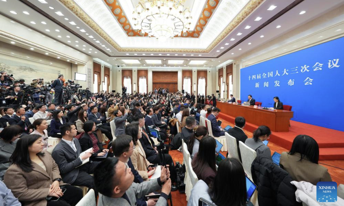 Lou Qinjian, spokesperson for the third session of the 14th National People's Congress (NPC), attends a press conference at the Great Hall of the People in Beijing, capital of China, March 4, 2025. (Xinhua/Liu Dawei)