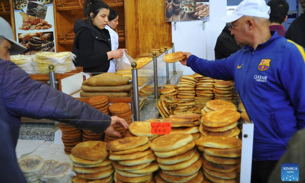 Tunisians buy food for the Iftar meal at a market in Tunis, Tunisia on March 1, 2025. Tunisia entered Ramadan on March 1. (Photo by Adel Ezzine/Xinhua)