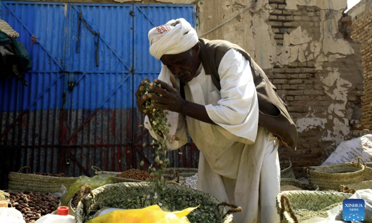 A vendor is seen at Dongola Grand Market ahead of the holy month of Ramadan in Dongola, Sudan, Feb. 25, 2025. (Photo by Magdi Abdalla/Xinhua)