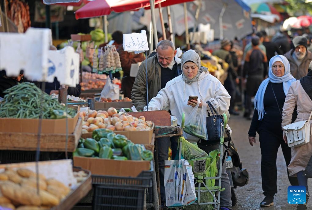 People buy vegetables for Ramadan in Beirut, Lebanon, on Feb. 27, 2025. (Photo: Xinhua)