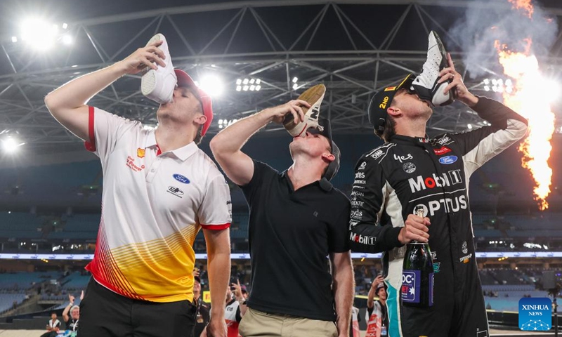 Runner-up Chaz Mostert (R) of Australia celebrates with teammates Brodie Kostecki (L) and Will Brown after the Race of Champions (ROC) at Accor Stadium in Sydney, Australia, March 8, 2025. Photo: Xinhua