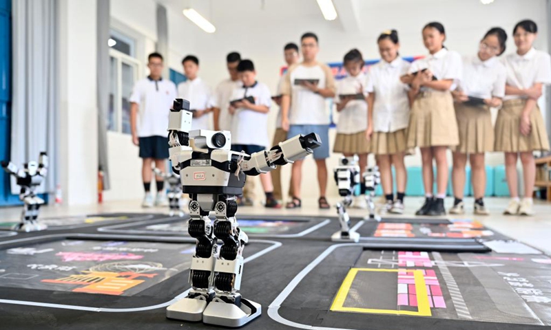 Students have an artificial intelligence lesson at a middle school in Liuzhou, south China's Guangxi Zhuang Autonomous Region, Sept. 2, 2024. Photo: Xinhua